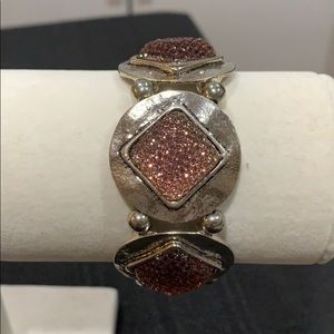 NWOT Silver toned bracelet with pink garnet stones